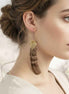 Boucles d'oreilles créoles en quartz et plume