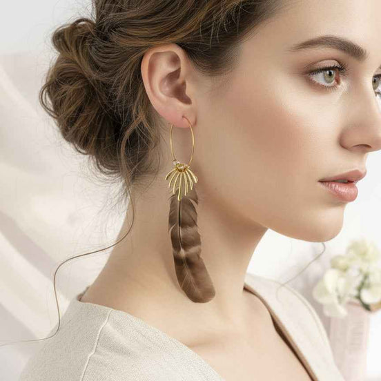 Boucles d'oreilles créoles en quartz et plume