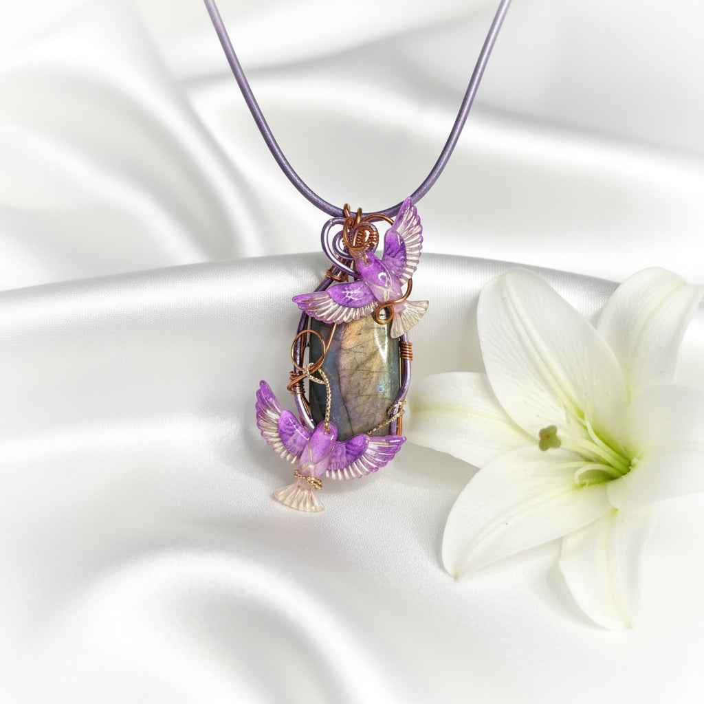 Collier phénix et sa labradorite rose sertie
