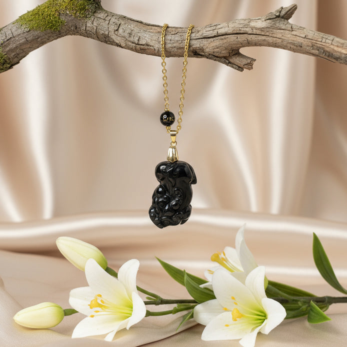 collier doré pixiu obsidienne