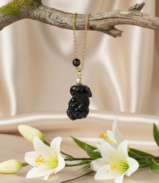 collier doré pixiu obsidienne