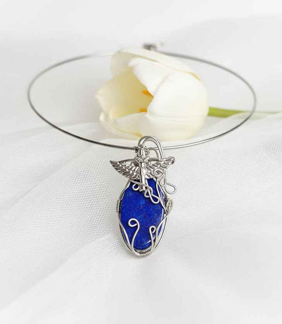 Torque Isis argenté en lapis lazuli extra sertie de cuivre