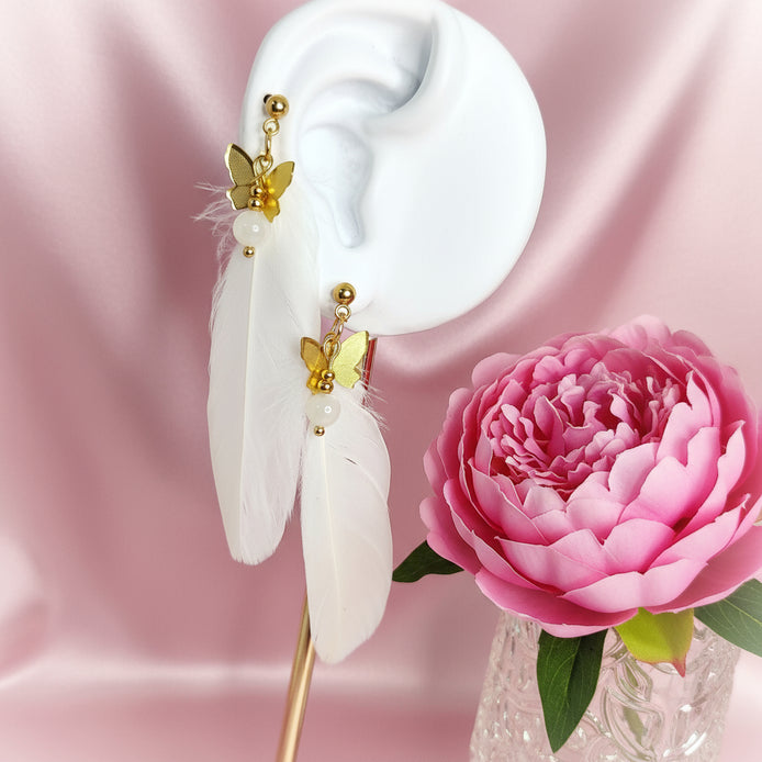 Boucles d'oreilles dorées plume céleste et pierre de lune