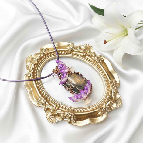 Collier phénix et sa labradorite rose sertie
