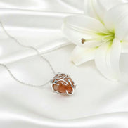 Collier argenté et Pierre de soleil AA