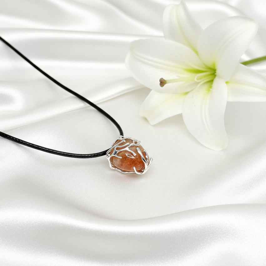 Collier noir argenté et Pierre de soleil AA