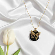 Collier papillon doré en tourmaline noire