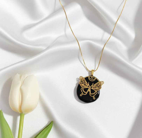 Collier papillon doré en tourmaline noire