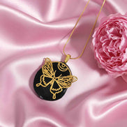 Collier papillon doré en tourmaline noire