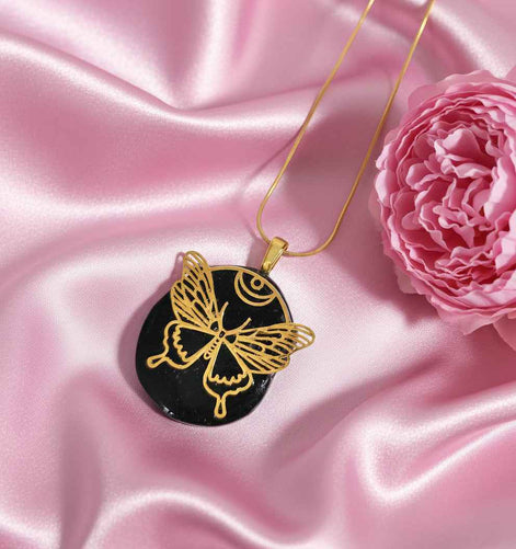 Collier papillon doré en tourmaline noire