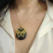 Collier papillon doré en tourmaline noire