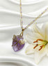 Collier doré violet et papillon et son améthyste