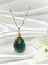 Collier doré en malachite extra et acier inoxydable