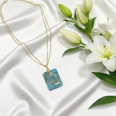 collier double chaine doré en pierre