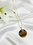 Collier doré et oeil de tigre, trèfle