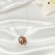 Collier argenté et Pierre de soleil serti