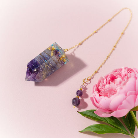 pendule en améthyste fait mains