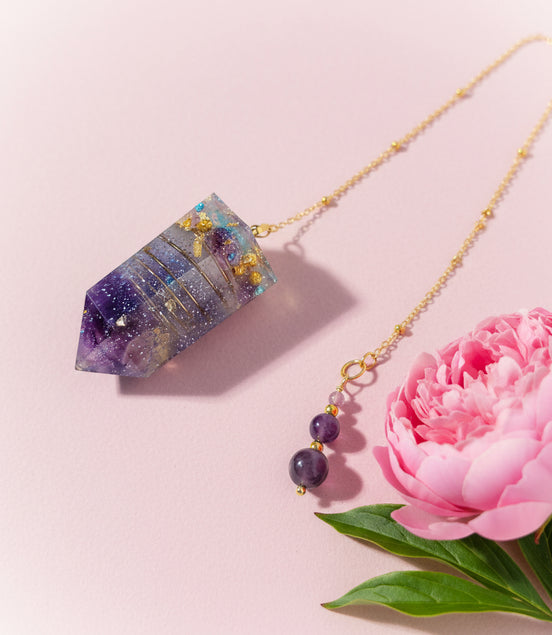 pendule en améthyste fait mains