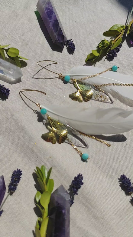 boucles d'oreilles féérique plume blanche
