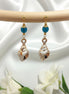 Boucles d'oreilles dorée Coquillages pierre