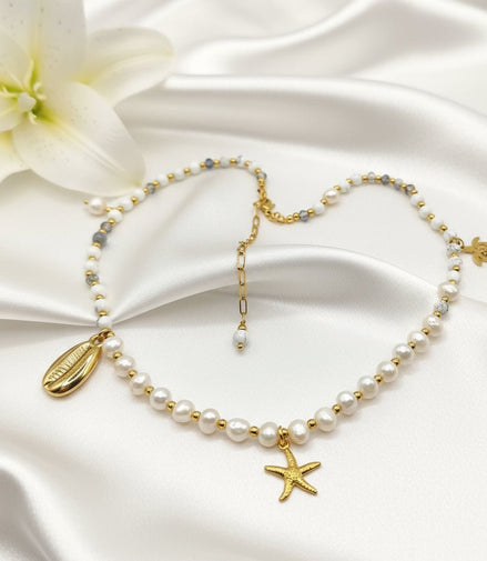 Collier 2 en 1 Éclat d’Écume en perles d'howlite, d'eau douce, et étoiles de mer. - Secret de Cristaux