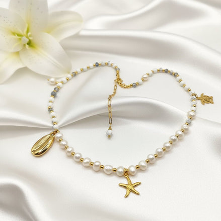 Collier 2 en 1 Éclat d’Écume en perles d'howlite, d'eau douce, et étoiles de mer. - Secret de Cristaux
