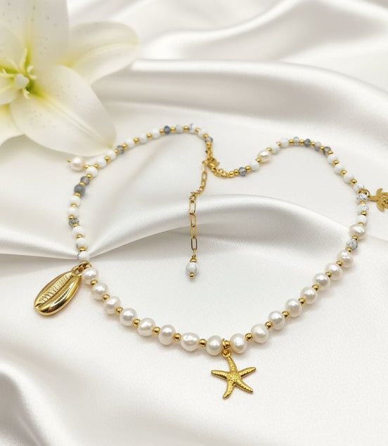 Collier 2 en 1 Éclat d’Écume en perles d'howlite, d'eau douce, et étoiles de mer. - Secret de Cristaux