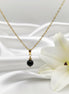 Collier et sa Perle de pierre obsidienne
