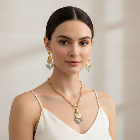 collier boucles d'oreilles doré aigue marine 