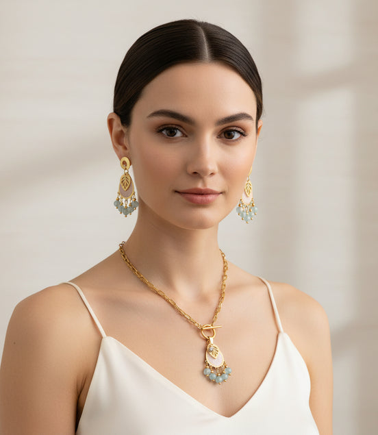 collier boucles d'oreilles doré aigue marine 
