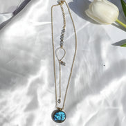 collier doré labradorite et descente de dos
