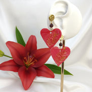 boucles d 'oreilles coeur rouge grenat