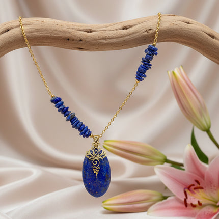 collier doré unalome et pierre