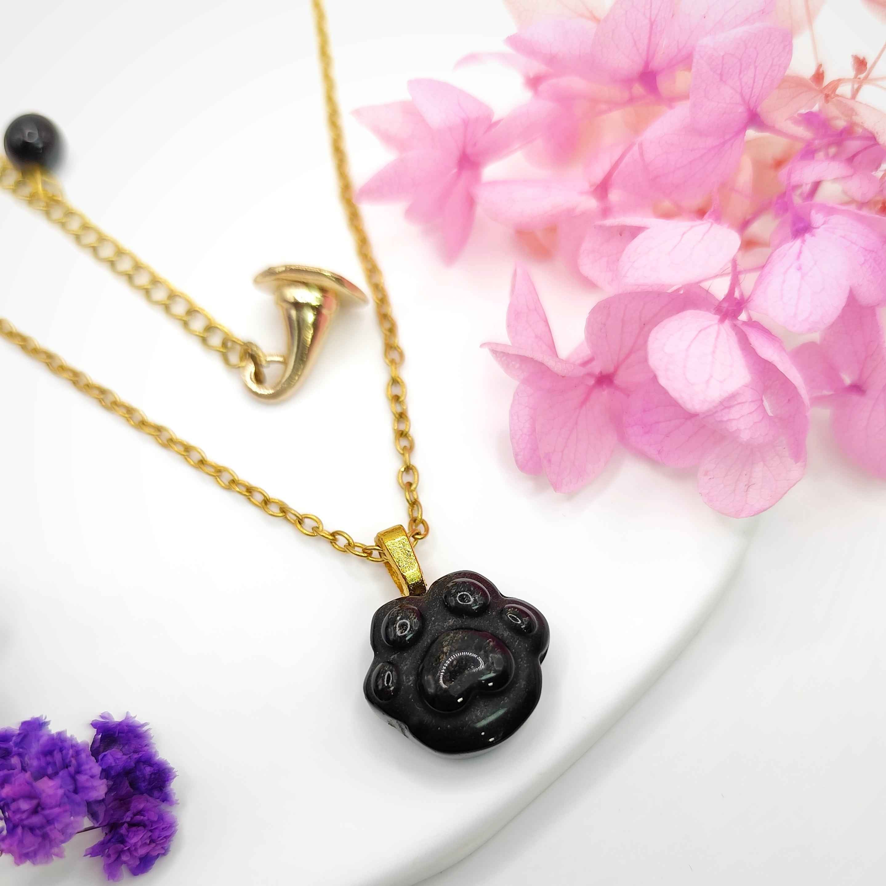 Collier doré en Obsidienne patte de chat
