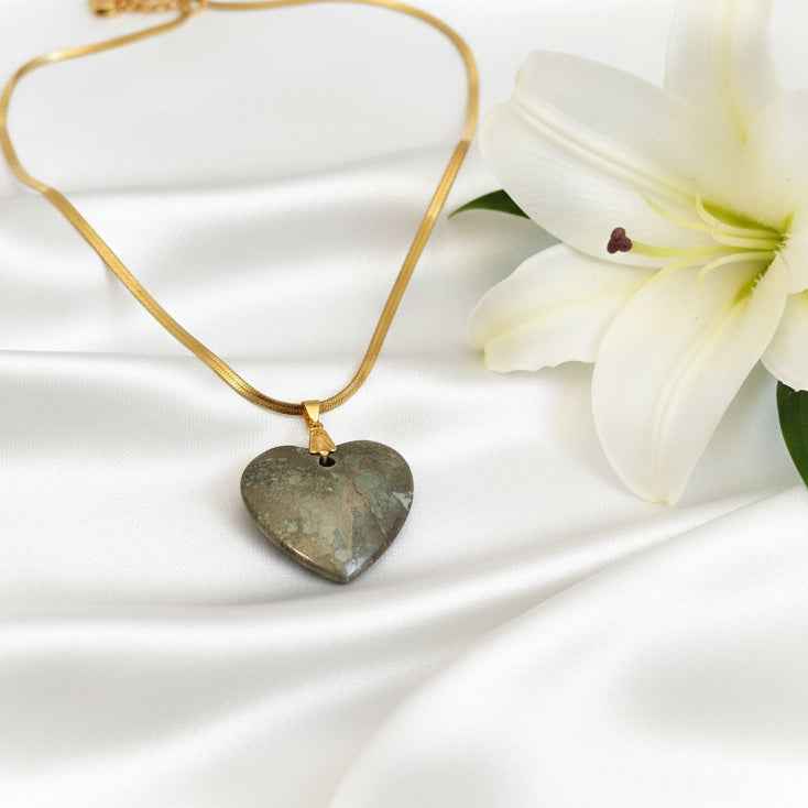 Collier Éclat doré en Pyrite sur chaine