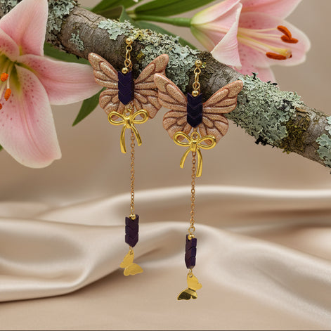 Boucles d'oreilles dorées papillon, hématite et polymère