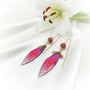 Boucles d'oreilles Ailes de fée en Rhodonite, dorée