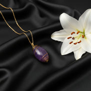collier doré améthyste