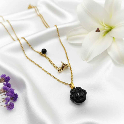 Collier doré en Obsidienne patte de chat