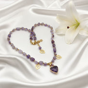 collier de perles en pierres améthyste coeur