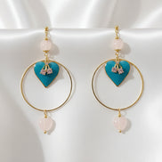Boucles d'oreilles dorées coeur, quartz rose