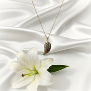 collier doré pyrite