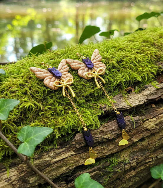 Boucles d'oreilles dorées papillon, hématite et polymère
