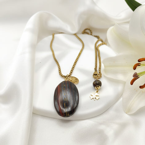 Collier long doré et oeil de fer sur bélière acier inoxydable