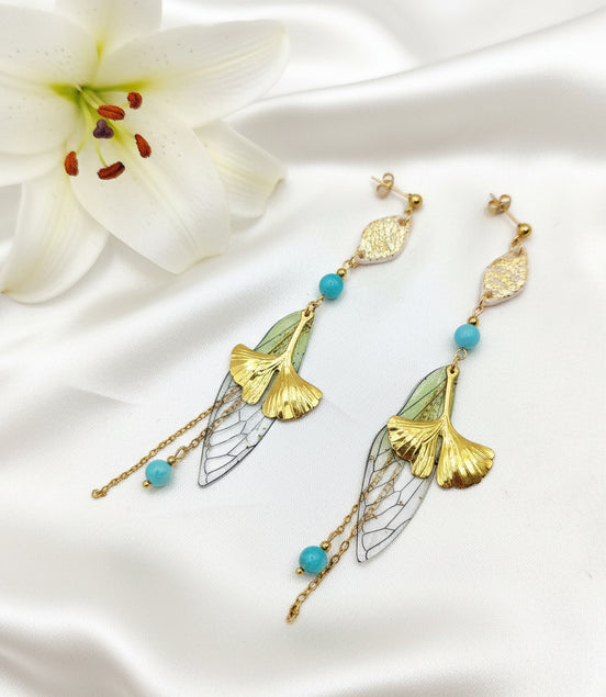 boucles doreilles longues doré  originales 70