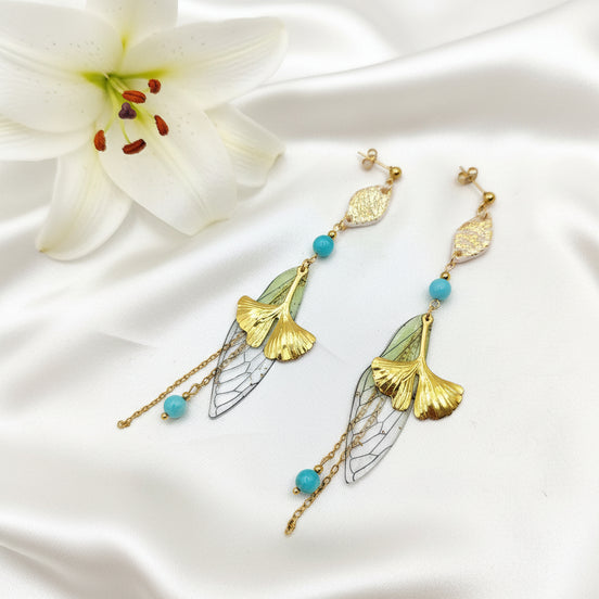 boucles doreilles longues doré  originales 70
