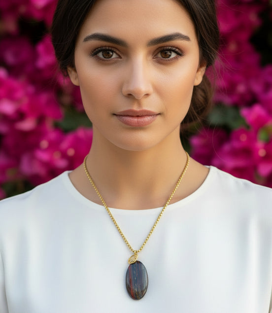 Collier long doré et oeil de fer sur bélière acier inoxydable