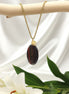 Collier long doré et oeil de fer sur bélière acier inoxydable