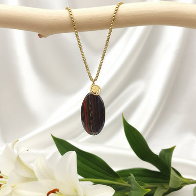 Collier long doré et oeil de fer sur bélière acier inoxydable