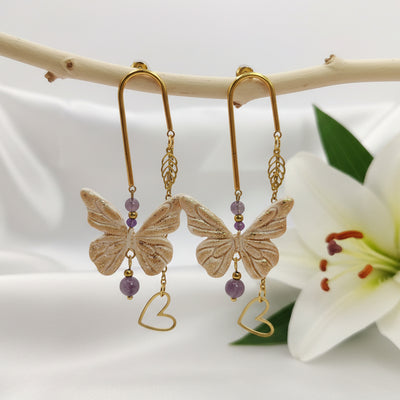 Boucles d'oreilles papillon rose dorées, améthyste & polymère